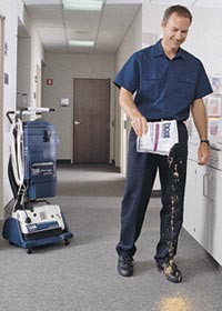 man using industrial vacuum