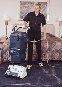 woman using industrial vacuum